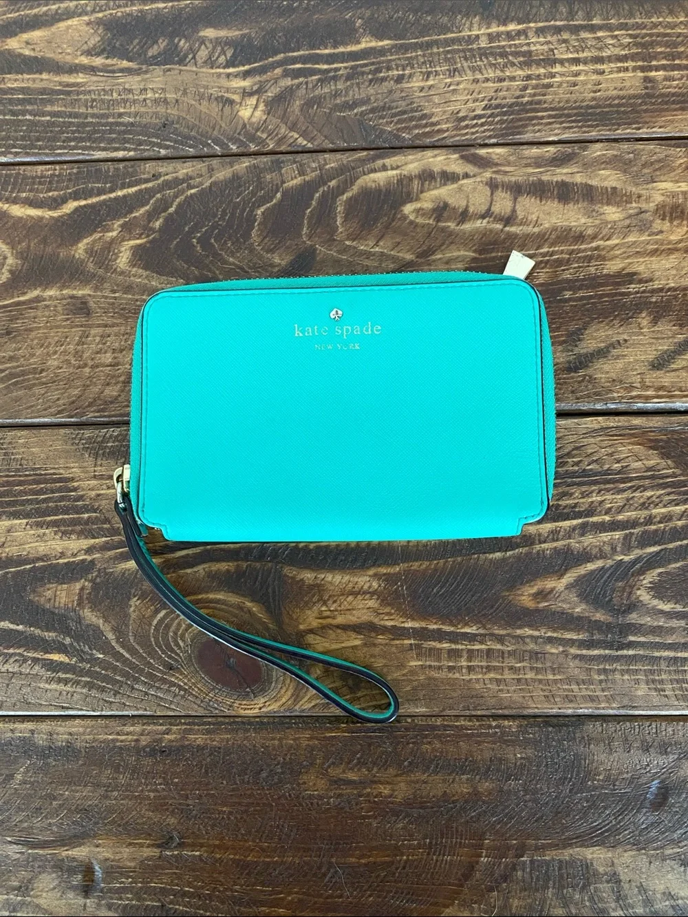 kate spade teal zip-around wristlet with strap